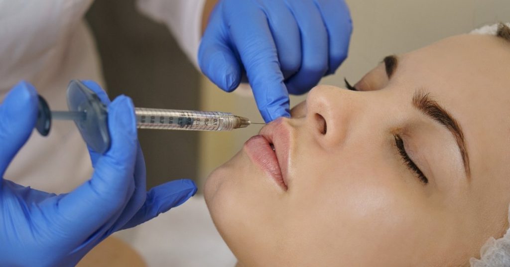 Who is a candidate for lip filler injection?